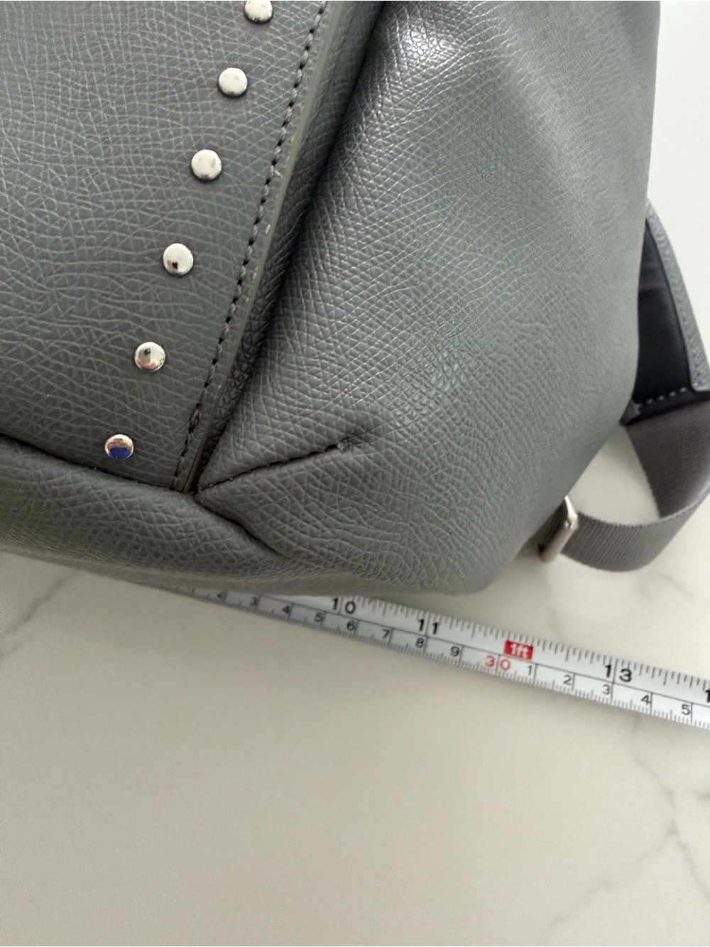 Tumi Women’s Gray Leather Studded Backpack. Large size.
NWOT. Never used it. - Picture 12 of 16